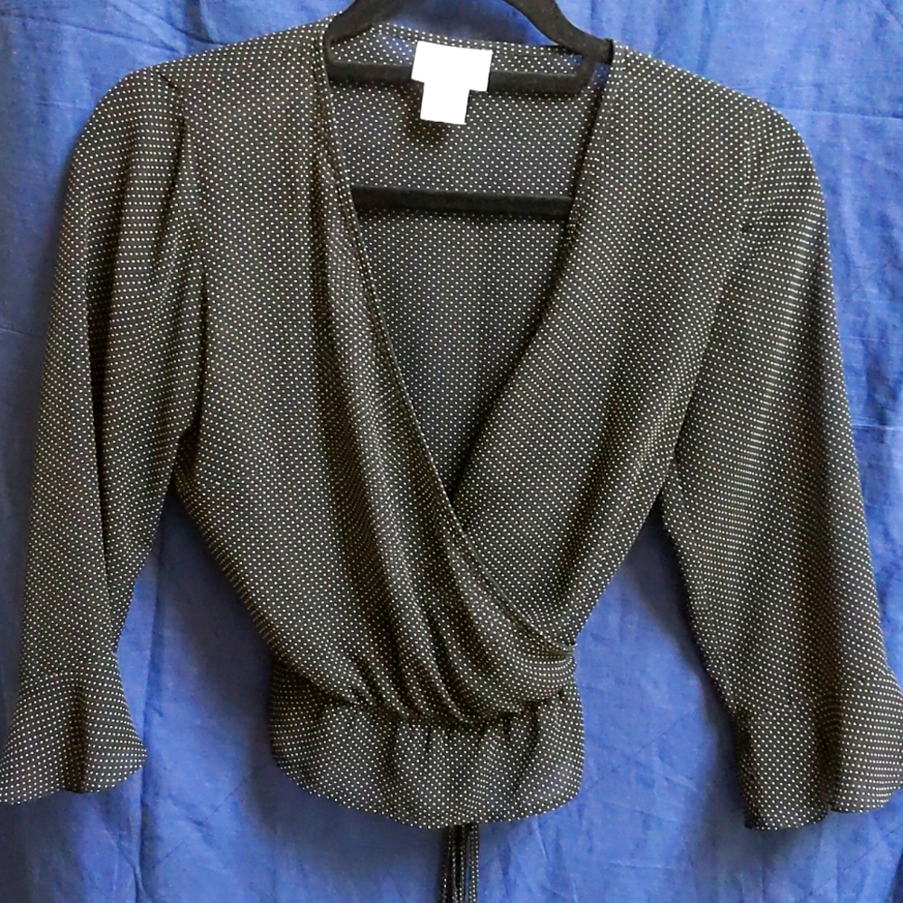 Black and white polka dot wrap around top